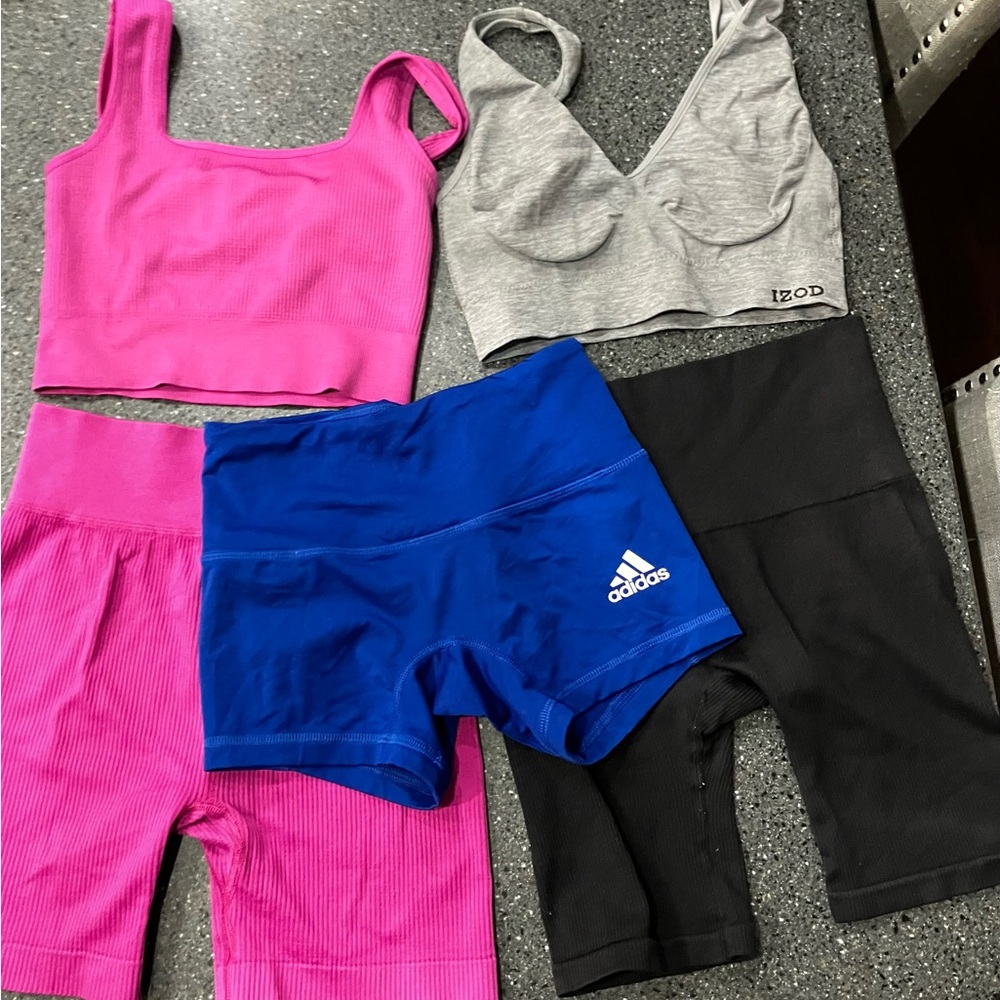 SO Pink Bike Shorts and sports bra and black and blue bike shorts and grey sp